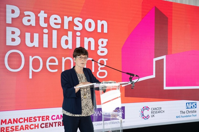 A photo of Christie patient Adele Adams speaking at the opening of the Paterson Building at The Christie.