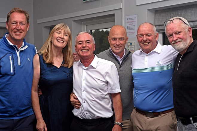 A photo of a group of men and a woman at a golf fundraising event for The Christie Charity.