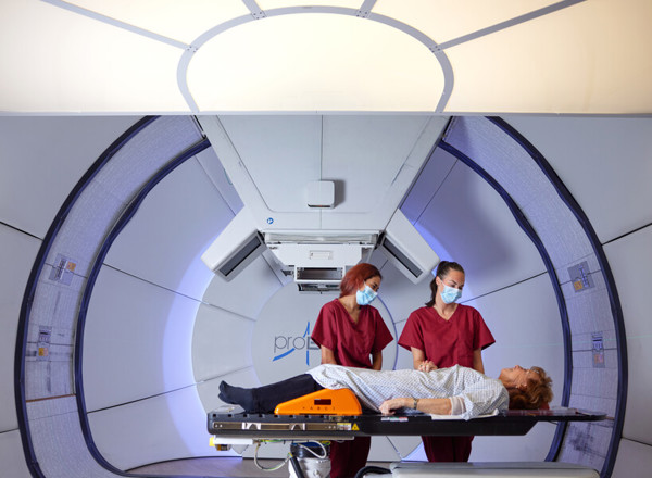 Proton beam therapy, gantry, PBT patient, Kate Robertson, Radiographer, Adeeba Halim, Pan Artists, Patricia Dawson, September 2022