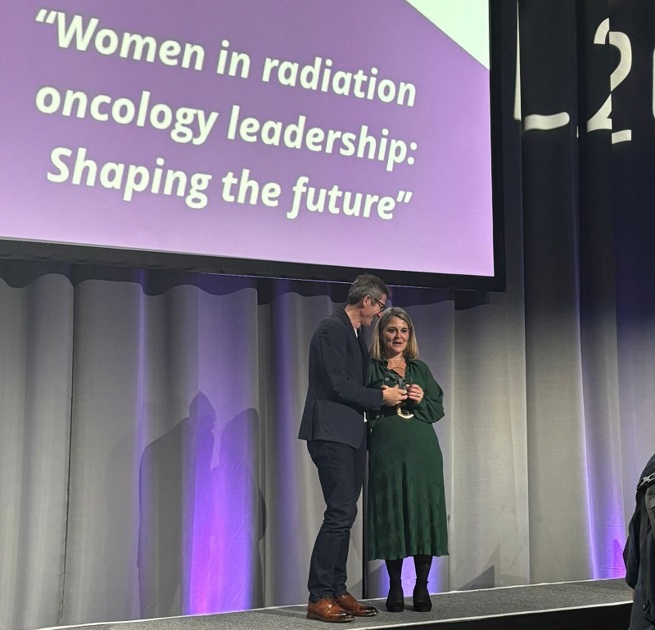 A photo of Professor Corinne Faivre-Finn, Consultant Oncologist at The Christie, receiving the prestigious Breur Award at this year’s European Society for Radiotherapy and Oncology (ESTRO) Congress in Vienna.