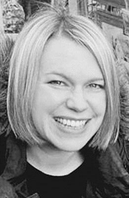 A black and white photo of Dr Joanna Williams from The Christie.