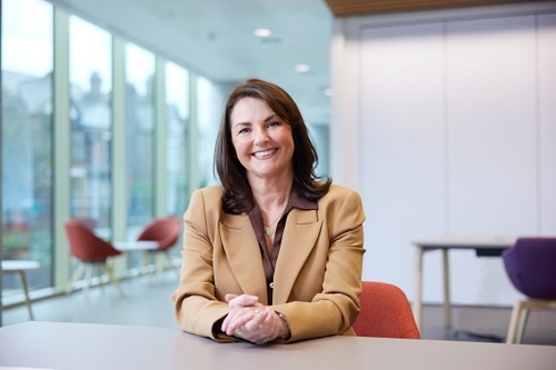 A black-and-white photo of Amanda Oates.