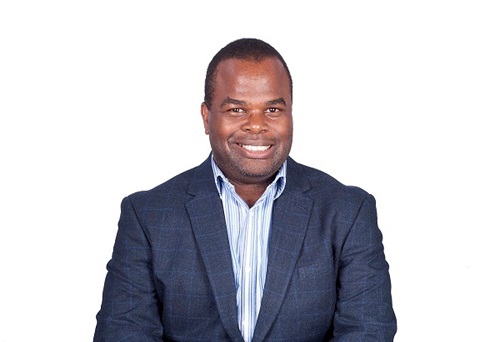 A photo of Dr Peter Mbanu.